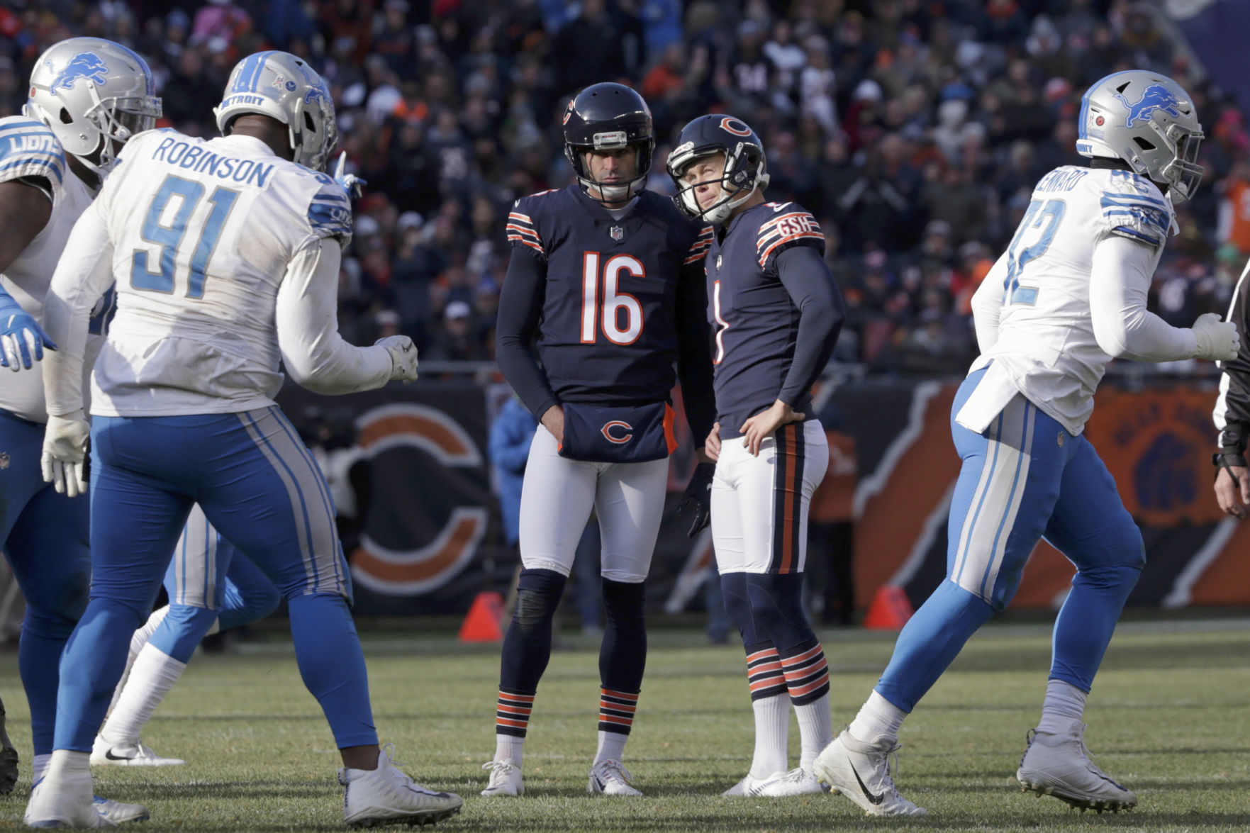 4. Photos and video captured Parkey pointing to the sky after the miss and kneeling in a postgame prayer circle after the game.